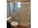 This bathroom features a sleek glass shower with stylish tile work at 8700 Ross Ln, New Port Richey, FL 34654