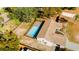 Aerial view showing home, pool, and backyard at 9053 Nakoma Way, Weeki Wachee, FL 34613