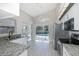 Modern kitchen with stainless steel appliances and granite counters at 1060 Vista Fina Ct, Spring Hill, FL 34608