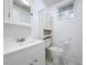 Simple bathroom with vanity and toilet at 11015 Rollingwood Dr, Port Richey, FL 34668