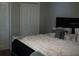 King-size bedroom with plush bedding at 11261 Redgate St, Spring Hill, FL 34609