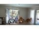 Bright dining area with sliding doors leading to the pool at 11261 Redgate St, Spring Hill, FL 34609