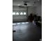 Attached garage with automatic opener and ample storage at 11261 Redgate St, Spring Hill, FL 34609