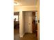 Hallway view offering access to bedroom and kitchen at 11261 Redgate St, Spring Hill, FL 34609