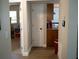 Hallway leading to bedrooms and kitchen at 11261 Redgate St, Spring Hill, FL 34609
