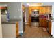 Updated kitchen with stainless steel appliances and granite countertops at 11261 Redgate St, Spring Hill, FL 34609
