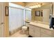 Clean bathroom with a shower/tub combo and updated vanity at 12289 Glen Haven St, Spring Hill, FL 34609