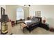 Spacious bedroom with a large window and carpeted floor at 12289 Glen Haven St, Spring Hill, FL 34609