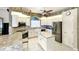 Updated kitchen with granite countertops and stainless steel appliances at 12289 Glen Haven St, Spring Hill, FL 34609