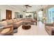 Open living room with a view of the kitchen and dining area at 12289 Glen Haven St, Spring Hill, FL 34609