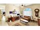 Home office with a large desk, comfortable seating, and natural light at 12289 Glen Haven St, Spring Hill, FL 34609