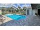Relaxing screened pool and patio area at 12289 Glen Haven St, Spring Hill, FL 34609