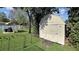 Spacious backyard storage shed with ramp access at 12289 Glen Haven St, Spring Hill, FL 34609