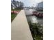 Private walkway leading to a canal-front dock at 13639 Frances Ave, Hudson, FL 34667