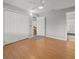 Wood floors lead to a closet and an open doorway at 230 Thorn Tree Pl # 230, Brandon, FL 33510