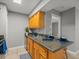Well-lit kitchen with granite counters, double sink, updated cabinets and hardware, offering a welcoming culinary space at 230 Thorn Tree Pl # 230, Brandon, FL 33510
