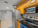 Kitchen features updated stainless steel appliances, granite counters, and ample cabinet space, ideal for cooking and storage at 230 Thorn Tree Pl # 230, Brandon, FL 33510