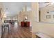 Bright and airy living room featuring hardwood floors and a view to the back yard at 2362 Whisper Walk Dr, Spring Hill, FL 34606