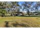 View of the house from the backyard showcasing the landscaping at 33288 Ridge Manor Blvd, Dade City, FL 33523