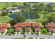Aerial view of community, showing home's location near pond at 3416 Lori Ln # 4, New Port Richey, FL 34655