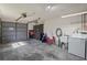 Attached garage with washer, dryer, and ample storage space at 3416 Lori Ln # 4, New Port Richey, FL 34655