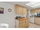 View of kitchen cabinets and countertops with a built-in oven at 3416 Lori Ln # 4, New Port Richey, FL 34655