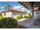 Private patio with brick pavers and lush landscaping at 3416 Lori Ln # 4, New Port Richey, FL 34655