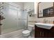 Updated bathroom with a tub shower combo and modern vanity at 3740 Cypress Meadows Rd, Tampa, FL 33624