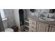 Clean bathroom with single sink vanity and toilet at 6434 Garvey Dr, New Port Richey, FL 34652