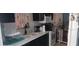 Clean and functional kitchen with white cabinets at 6434 Garvey Dr, New Port Richey, FL 34652