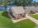 Aerial view of house and landscaped yard at 7562 Heather Walk Dr, Weeki Wachee, FL 34613