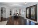 Formal dining room with dark hardwood floors at 9728 Milano Dr, Trinity, FL 34655