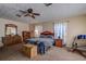 Spacious bedroom with ample closet space and ceiling fan at 10525 Hilltop Dr, New Port Richey, FL 34654