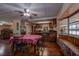 Bright dining area adjacent to kitchen, features a table with four chairs at 10525 Hilltop Dr, New Port Richey, FL 34654