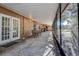 Relaxing screened porch with outdoor seating at 10525 Hilltop Dr, New Port Richey, FL 34654