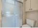 Clean bathroom with shower stall and built-in storage at 12141 Spartan Way # 204, Hudson, FL 34667