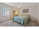 Bright bedroom featuring a comfortable bed and ample closet space at 12141 Spartan Way # 204, Hudson, FL 34667