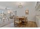 Dining area with table and chairs near living room at 12141 Spartan Way # 204, Hudson, FL 34667