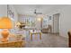 Living room with sofa, recliner, and coffee table at 12141 Spartan Way # 204, Hudson, FL 34667