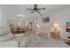 Living room with partial kitchen view at 12141 Spartan Way # 204, Hudson, FL 34667
