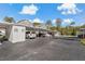 Covered parking area with assigned parking spots for residents at 12141 Spartan Way # 204, Hudson, FL 34667