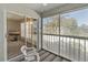 Spacious screened balcony overlooking a tranquil setting at 12141 Spartan Way # 204, Hudson, FL 34667