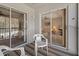 Private screened balcony with access from living area at 12141 Spartan Way # 204, Hudson, FL 34667