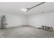 Garage with concrete floor and automatic garage door at 12440 Maycrest Ave, Weeki Wachee, FL 34614