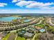 Community overview featuring numerous homes, lakes, and recreational facilities at 13022 Payton St, Odessa, FL 33556