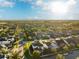 Community overview featuring houses, lakes, and lush greenery at 13022 Payton St, Odessa, FL 33556