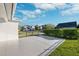 Backyard with paved patio, grassy area, and privacy fence at 13022 Payton St, Odessa, FL 33556