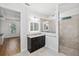 Bathroom with walk-in shower, granite vanity, and tile flooring at 13022 Payton St, Odessa, FL 33556