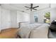 Bright bedroom with double doors and large windows at 13022 Payton St, Odessa, FL 33556