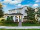 Two-story home with stone accents and a landscaped yard at 13022 Payton St, Odessa, FL 33556